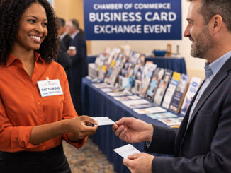 Factoring broker exchanging her business card with a business owner at a Chamber of Commerce event.