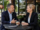 A factoring broker and bank lending officer having coffee.