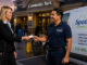 Broker handing a business card